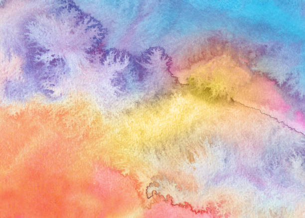 istock varicolored watercolor background 1302257323