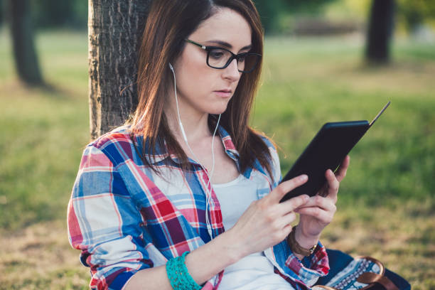 istock Woman studying in the countryside 1302257609