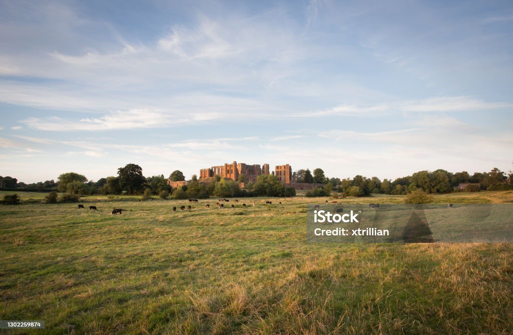 Panoramic of Kenilworth Castle at sunset Beautiful old English Castle in Warwickshire glowing golden beneath a big sky Kenilworth Castle Stock Photo