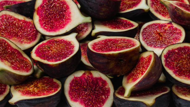 istock Tasty figs background. Top view. 1302260631