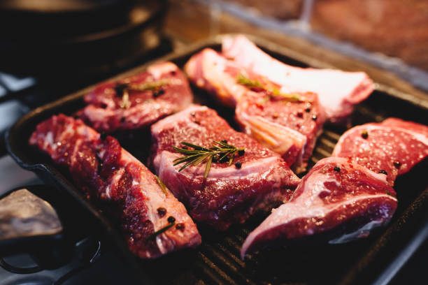 istock Preparing steak on the grill pan with seasonings 1302261248