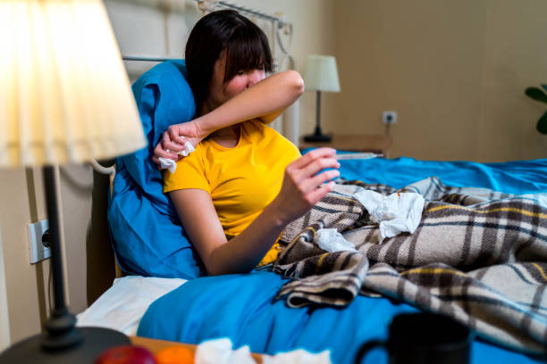 istock Sneezing woman 1302268810