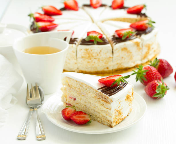 istock Sponge cake with strawberries and cream. Selective focus. 1302270885