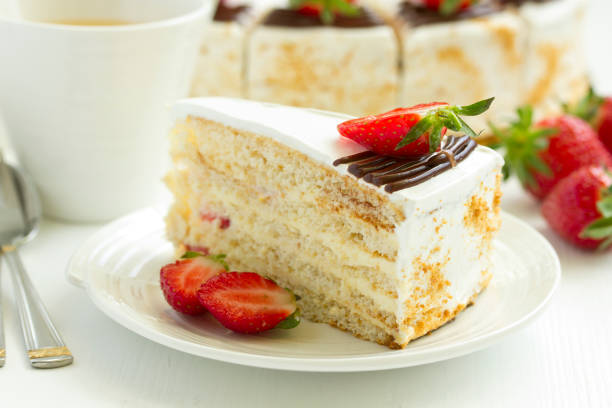 istock Sponge cake with strawberries and cream. Selective focus. 1302270906