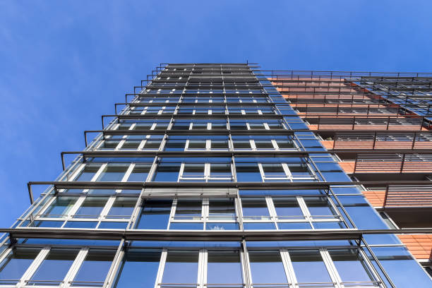 Modern office building facades with glass and reflecting sunlight in the windows