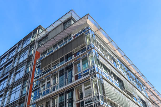 Modern office building facades with glass and reflecting sunlight in the windows