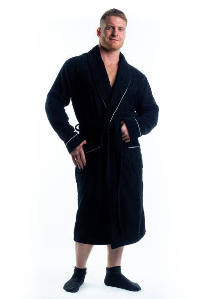 istock strong man in a Bathrobe on an isolated white background with a smile on his face. 1302275933