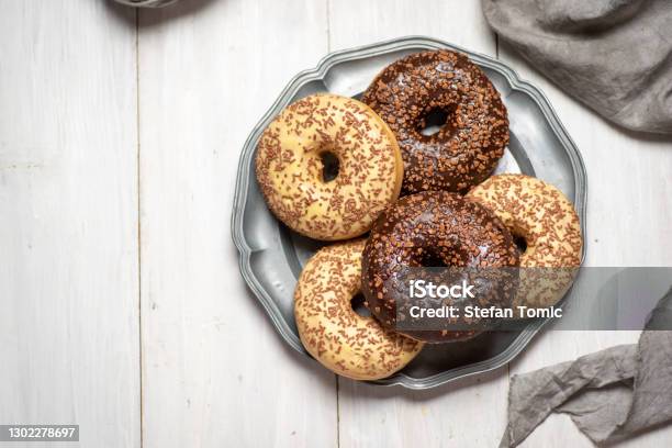 Sweet Donuts With Chocolate Sprinkles Stock Photo - Download Image Now - Doughnut, Bagel, Brown