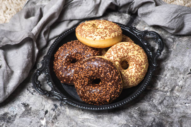 istock Sweet donuts with chocolate sprinkles 1302278801