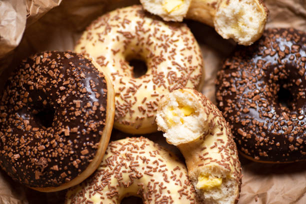 istock Sweet donuts with chocolate sprinkles 1302279119