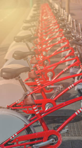 istock A row of bright red and black bicycles. 1302280484