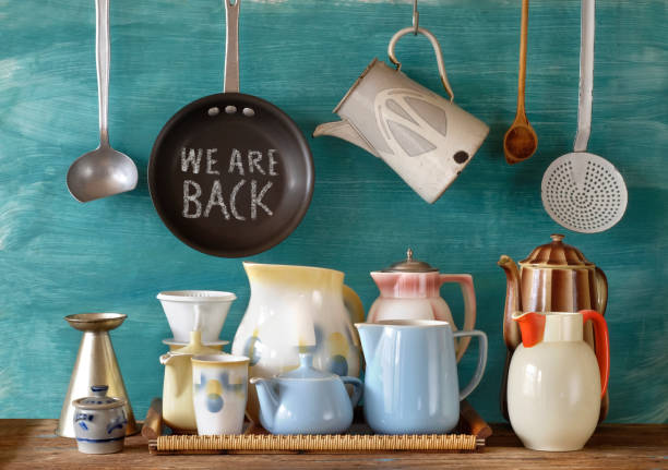 istock reopen sign, restaurant or cafe ready to service after corona lockdown, vintage kitchen utensils, crockery and message,concept 1302280617