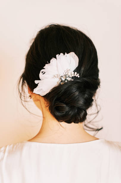 istock Trendy bridal hairstyle with beautiful wedding accessoires 1302280759