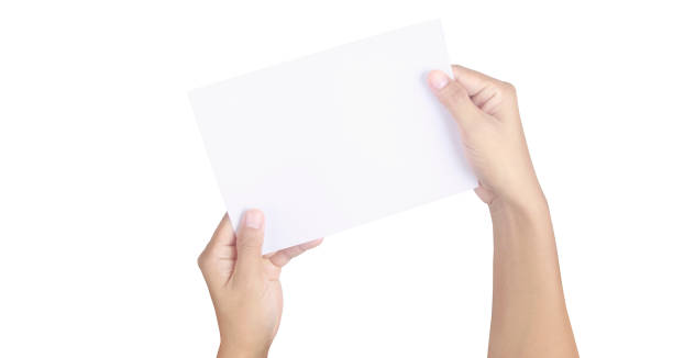 istock Hands holding paper blank for letter paper 1302280806