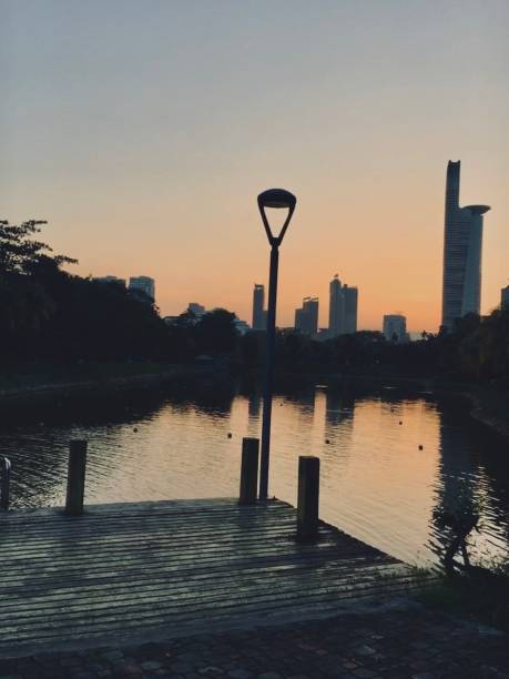 istock Lake by the city 1302281618