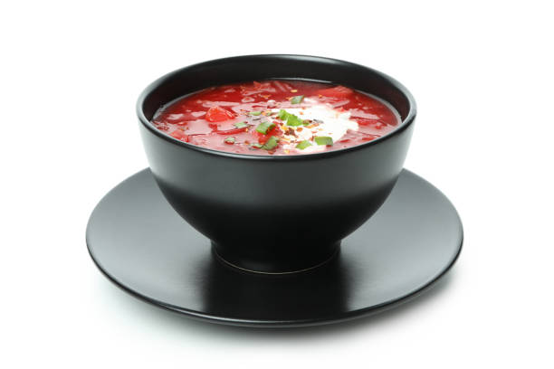 istock Bowl of beetroot soup isolated on white background 1302281750