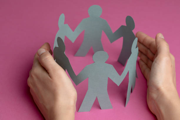 istock Hand Protecting Paper Family 1302283171