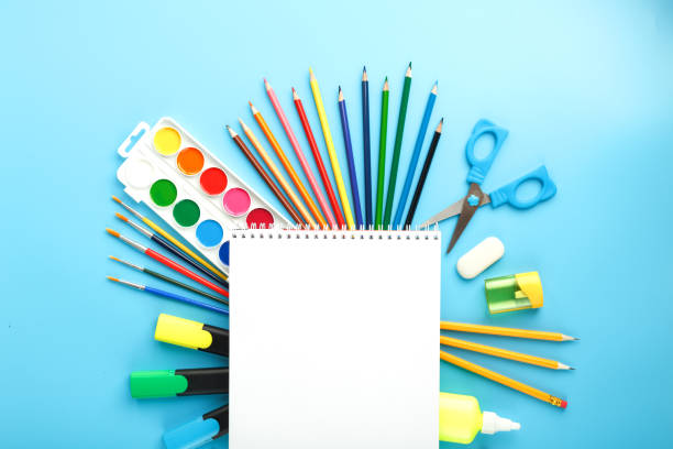 istock A set of school supplies for learning and creative development on a blue background. 1302284582