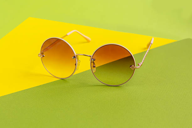 istock Sunglasses on a colored background. Isolate. Healthy eyes. 1302284912