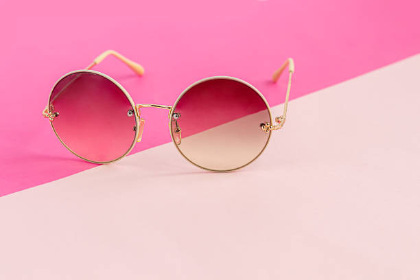 istock Sunglasses on a colored background. Isolate. Healthy eyes. 1302284915