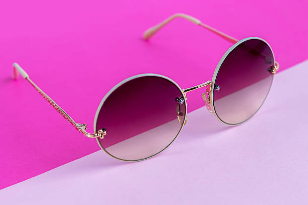 istock Sunglasses on a colored background. Isolate. Healthy eyes. 1302284929