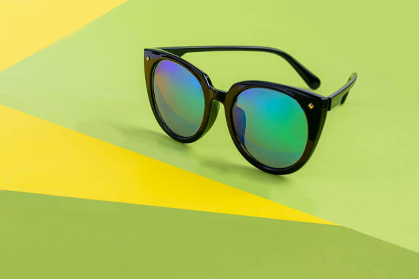 istock Sunglasses on a colored background. Isolate. Healthy eyes. 1302284930