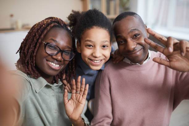 istock Modern African American Family using Video Chat POV 1302285767