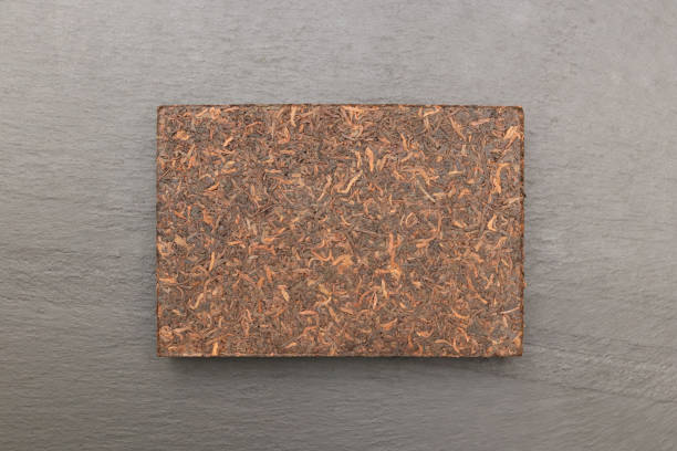 istock Pressed puer tea block. Health drink piece. 1302289392