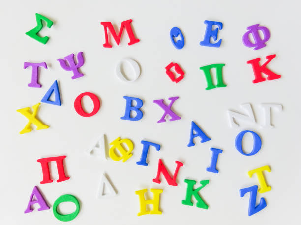 istock Colorful greek alphabet isolated on white background close up 1302295351
