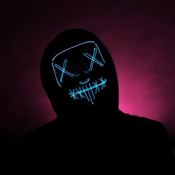 istock Incognito in a glowing blue mask on a highlighted red background 1302295974