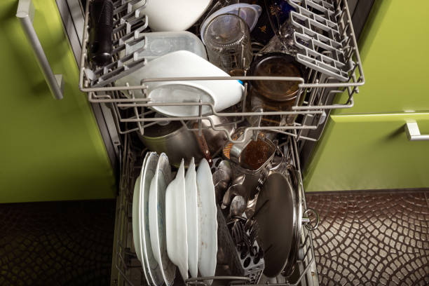 istock Dishwasher with dirty dishes 1302298423