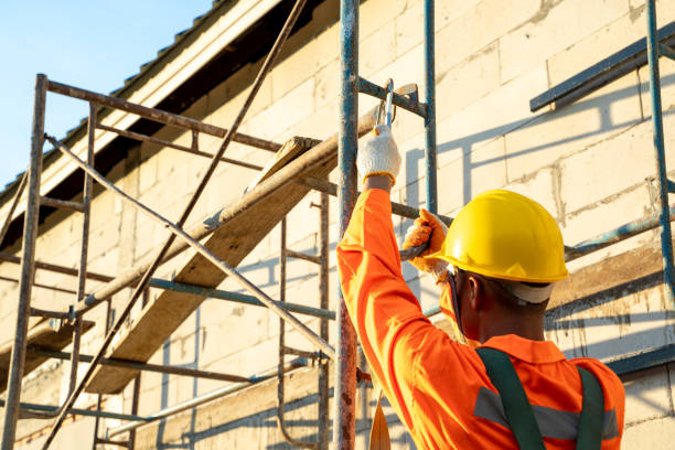 istock Construction worker wearing safety harness belt during working at high place. 1302299542