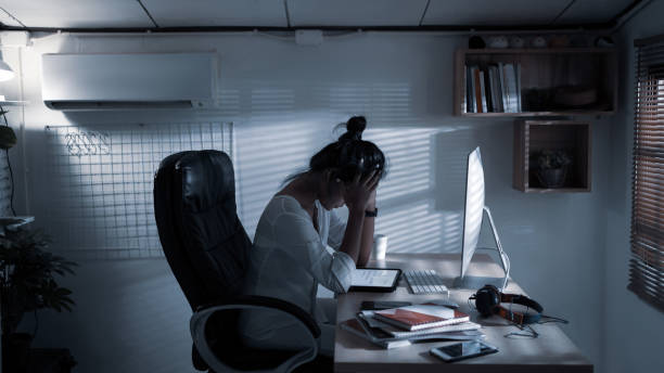 istock Asian woman She works at home She is stressed 1302299601