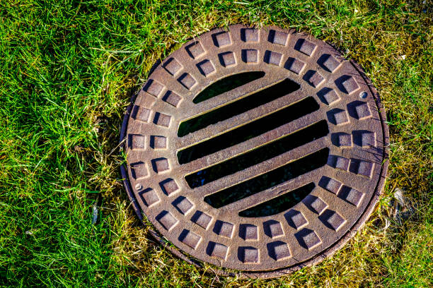istock old manhole at a street 1302302444