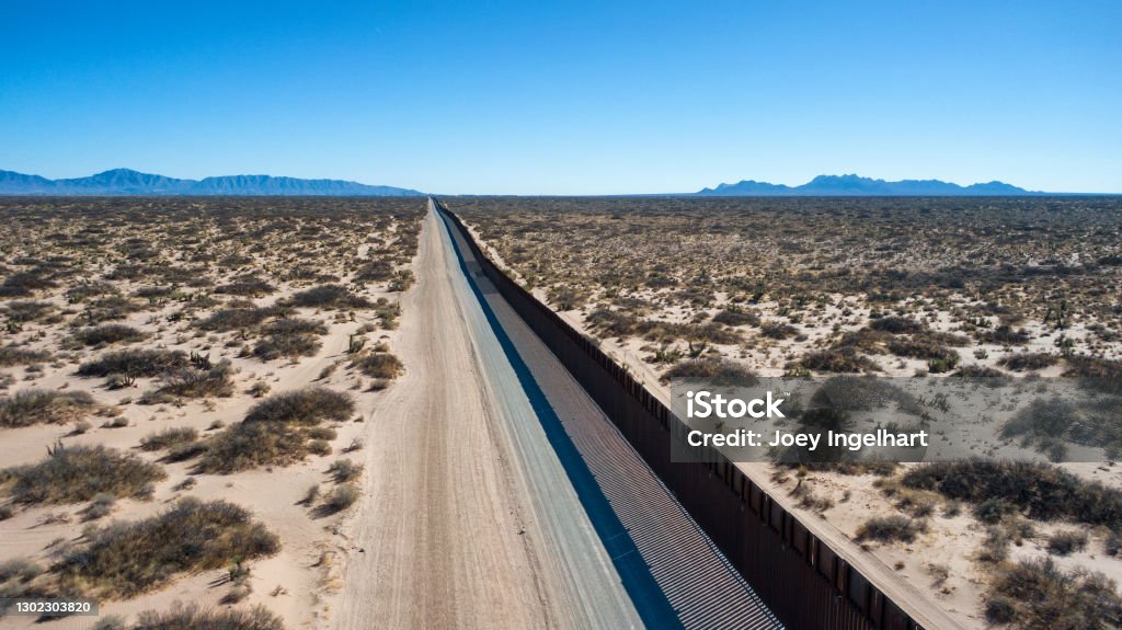 Drone View of the International Border Between Mexico and The United States Aerial View of the International Border Between Mexico and The USA. Geographical Border Stock Photo