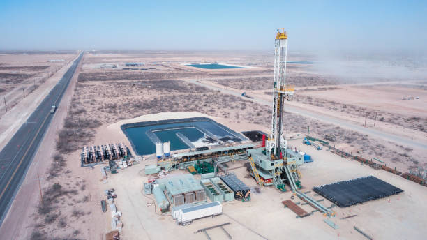 istock Drone View Of An Oil Or Gas Drill Fracking Rig Pad 1302303926