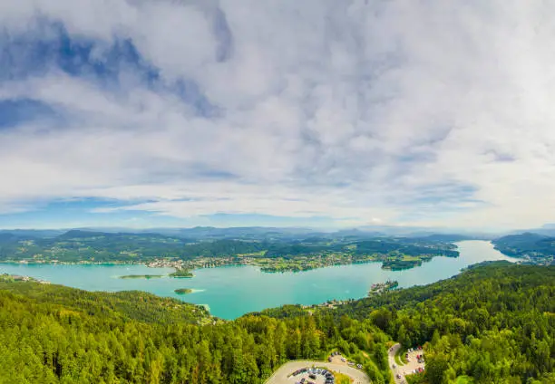 Photo of Aerial view of the alpine lake Worthersee, famous tourist attraction for many water activity in Klagenfurt, Carinthia, Austria