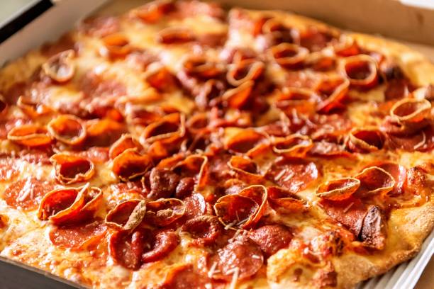 istock Delivered pepperoni pizza in its box 1302307332