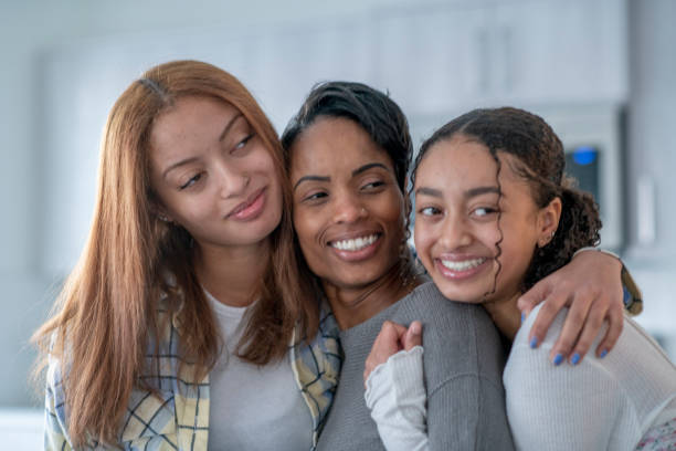 istock Mother and her teenage daughters 1302308807
