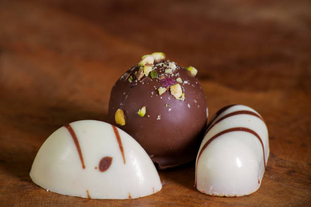 istock different chocolate candies close-up on a wooden board 1302309165