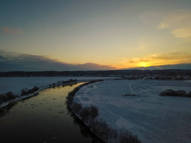 istock Beautiful winter landscape, sunset over the Dnipro river, view from the drone 1302309352