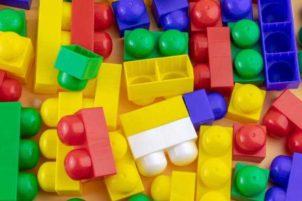 istock Colorful plastic toy blocks or brick toys. Child development concept. 1302311841