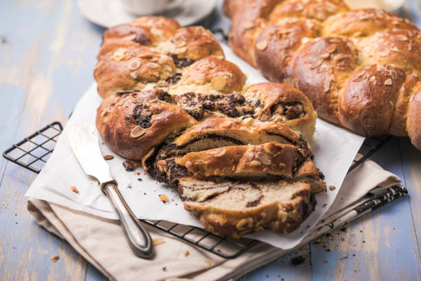 istock Tsoureki braid, greek easter sweet bread, on wood 1302314689