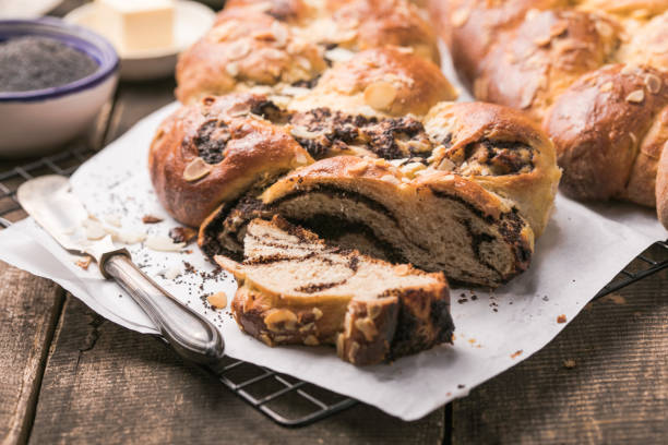 istock Tsoureki braid, greek easter sweet bread, on wood 1302314709