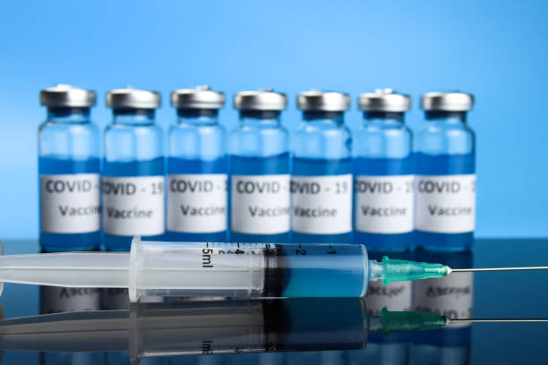 istock coronavirus vaccine injection. COVID-19 vaccination concept 1302315744