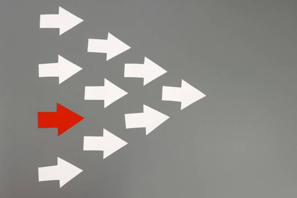 istock Leadership concept with red arrow leading 1302316202