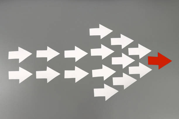 istock Leadership concept. Red leader arrow leading team forward 1302316398