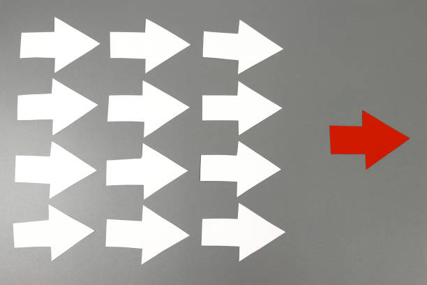 istock Leadership concept with red arrow leading 1302316930
