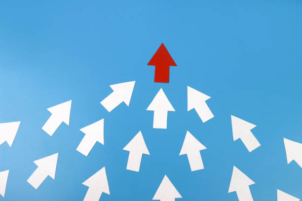 istock Leadership concept with red arrow leading 1302316970