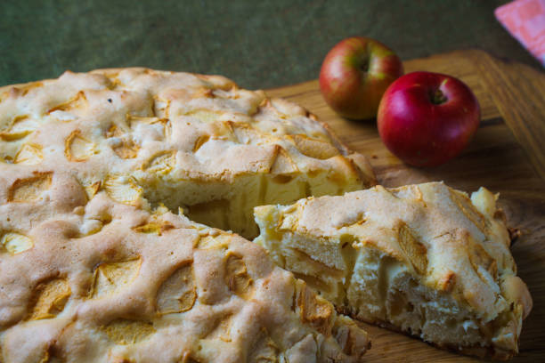 istock Traditional apple pie baked in a home oven. 1302318560